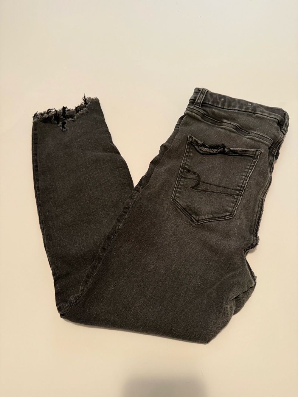 Black Distressed Raw Hem Skinny Jeans